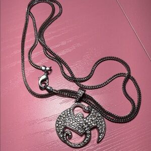 Strange Music pendant